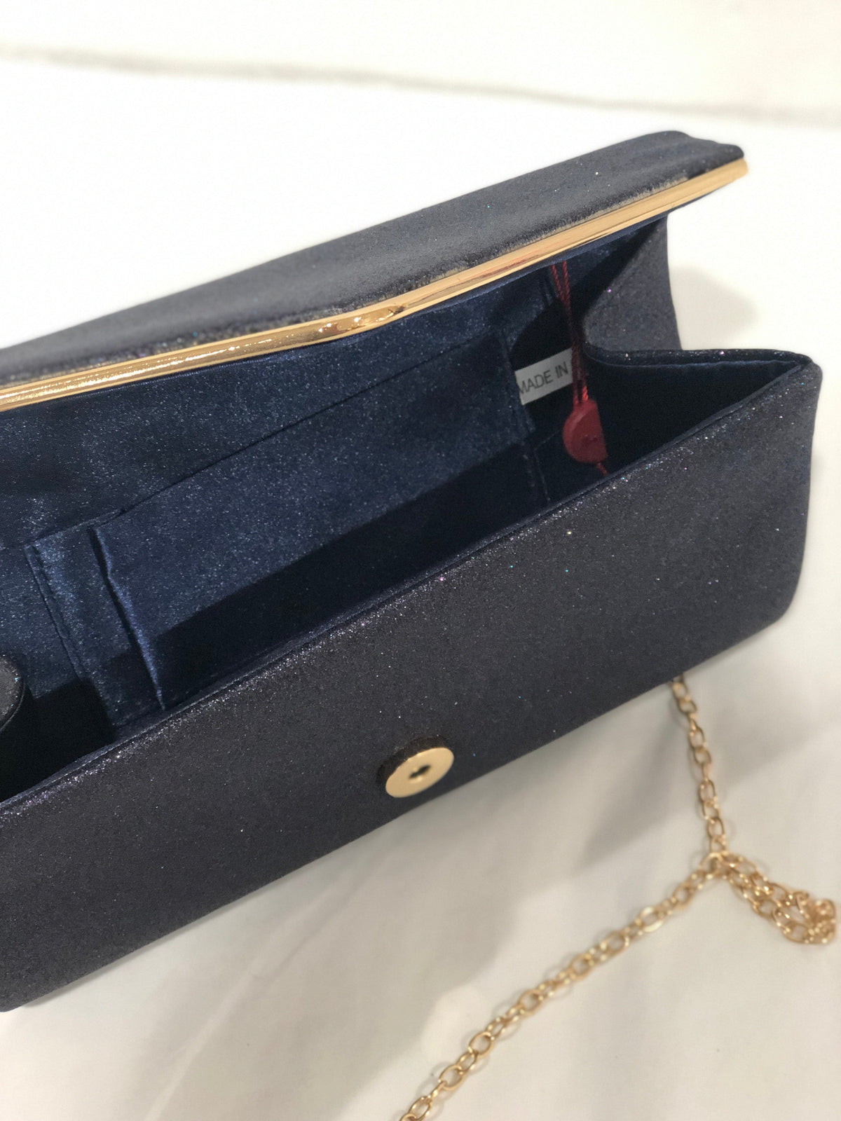 Claren Glitter Clutch