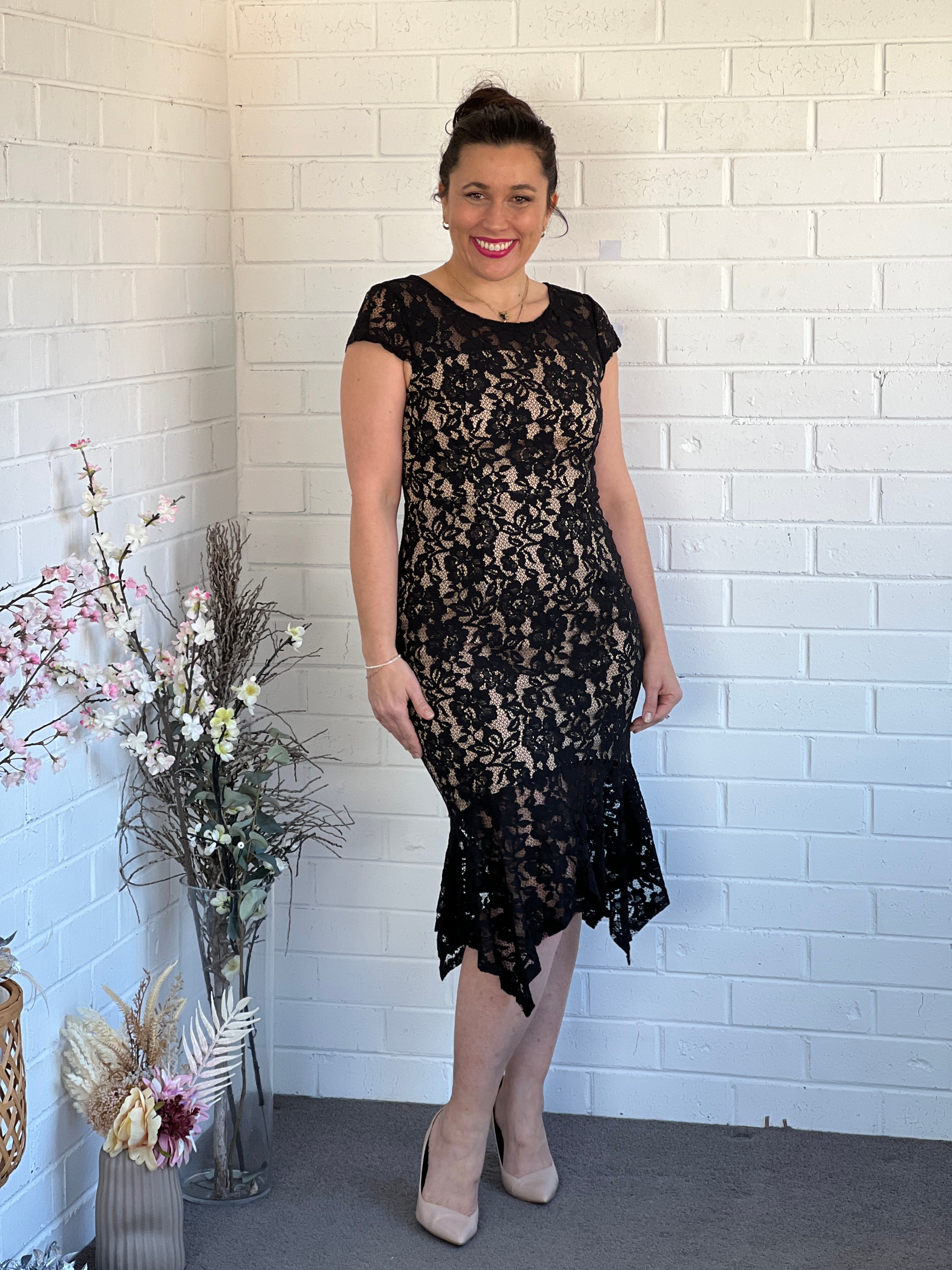 Black lace dress deals with beige lining